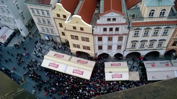 People gathered to witness a wedding on the street in Prague
